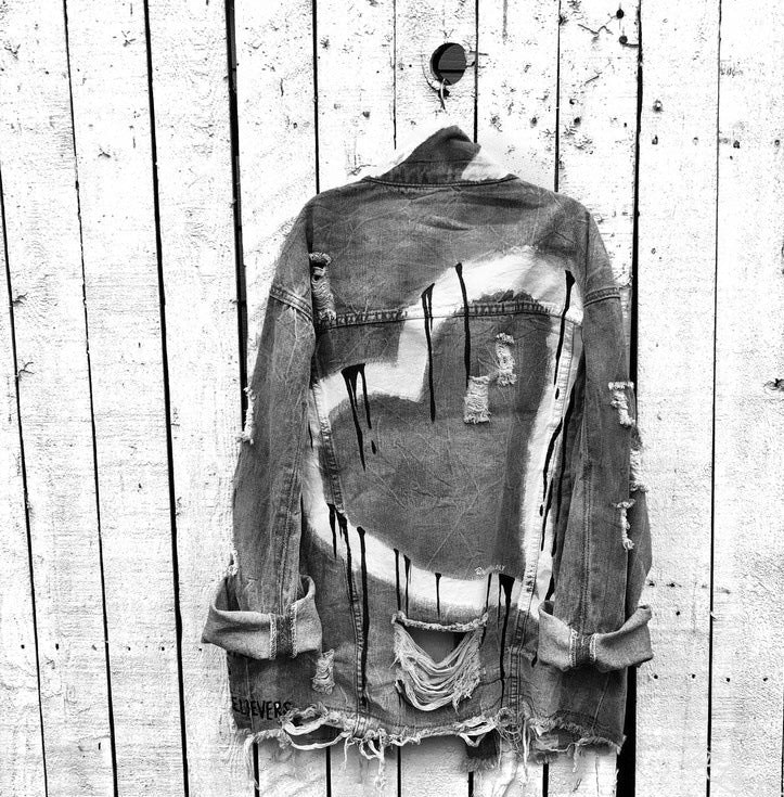 Ripped denim jacket